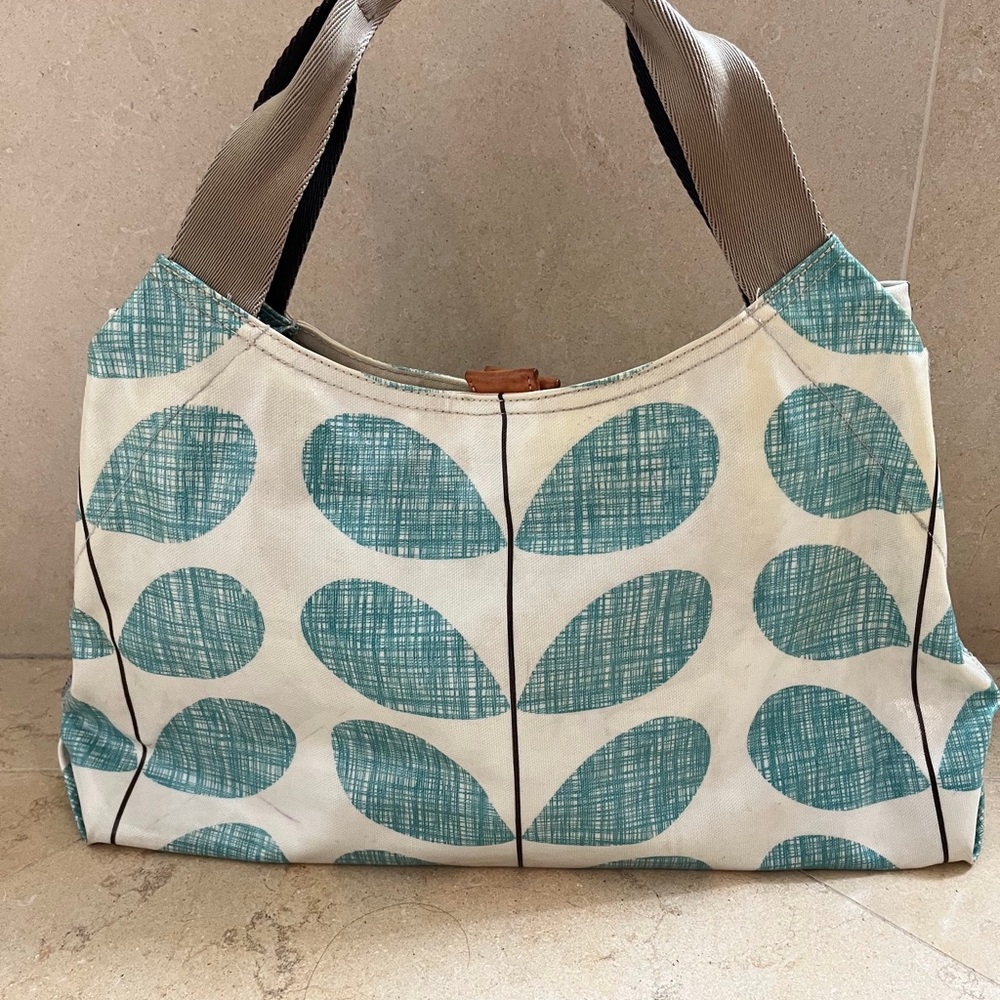 Orla Kiely laminated satchel iconic stem design.